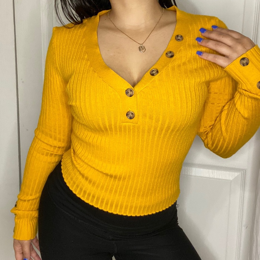 Bright yellow v neck sweater